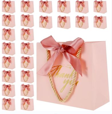 Boîtes rigides Logo personnalisé Emballage de vêtements Sacs en papier de luxe avec poignées